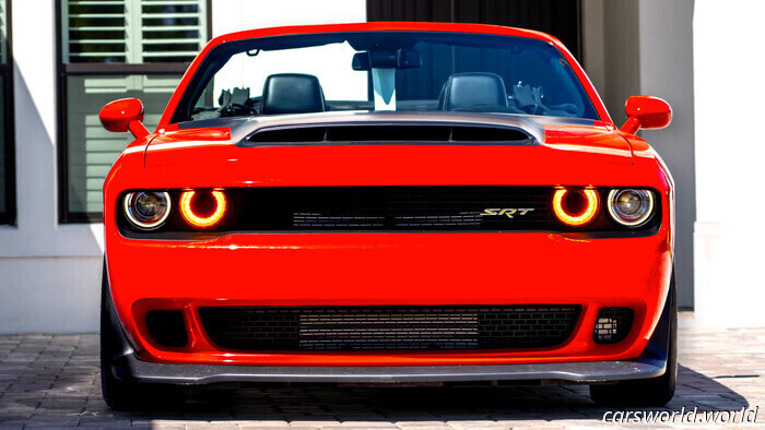 Un demone in topless 170 sta solo chiedendo problemi / Carscoops